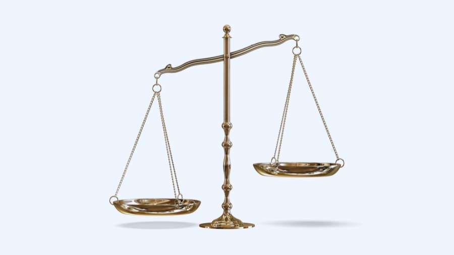 scales to represent fairness, tipped to one side